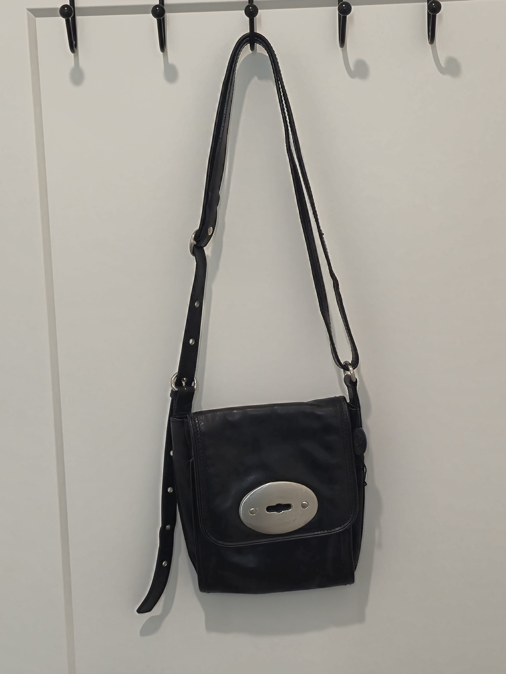 Black Leather Crossbody Bag with Silver Oval Turn Lock